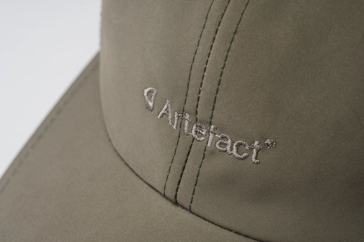 Tone-on-tone embroidered Artefact logo on the khaki Stratus cap
