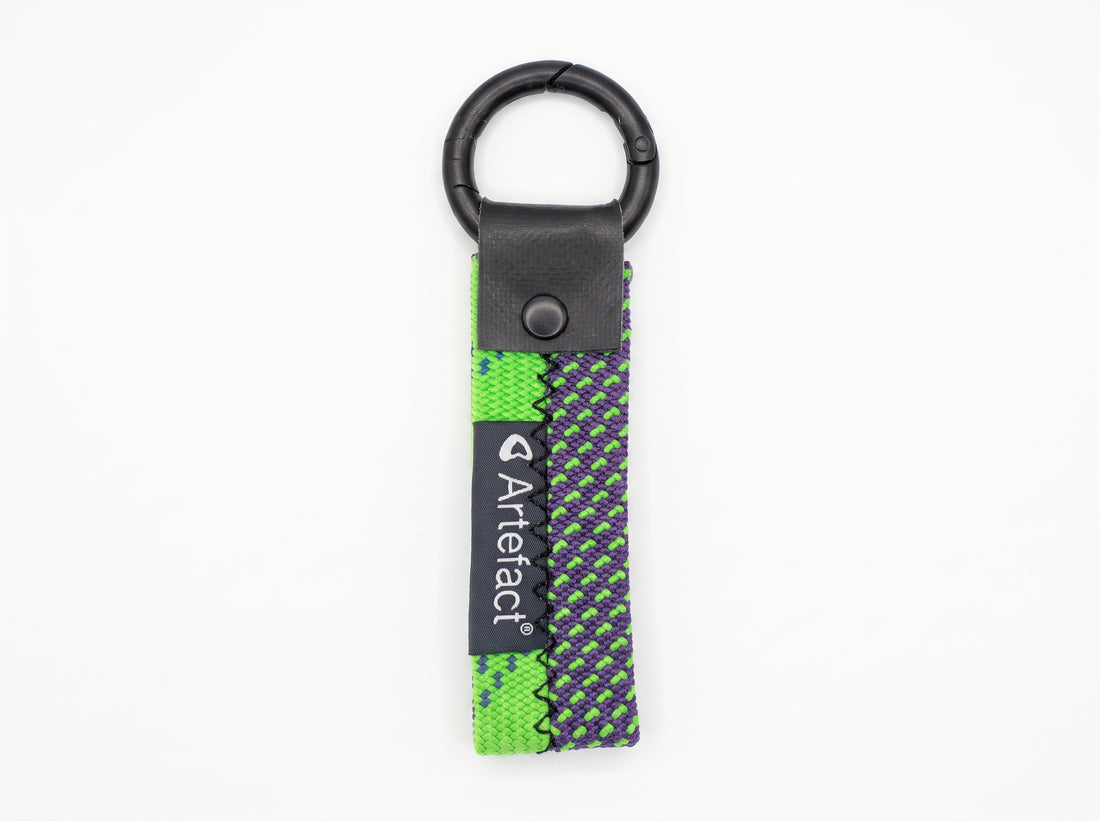 Upcycled climbing rope keyring, mostly green with purple
