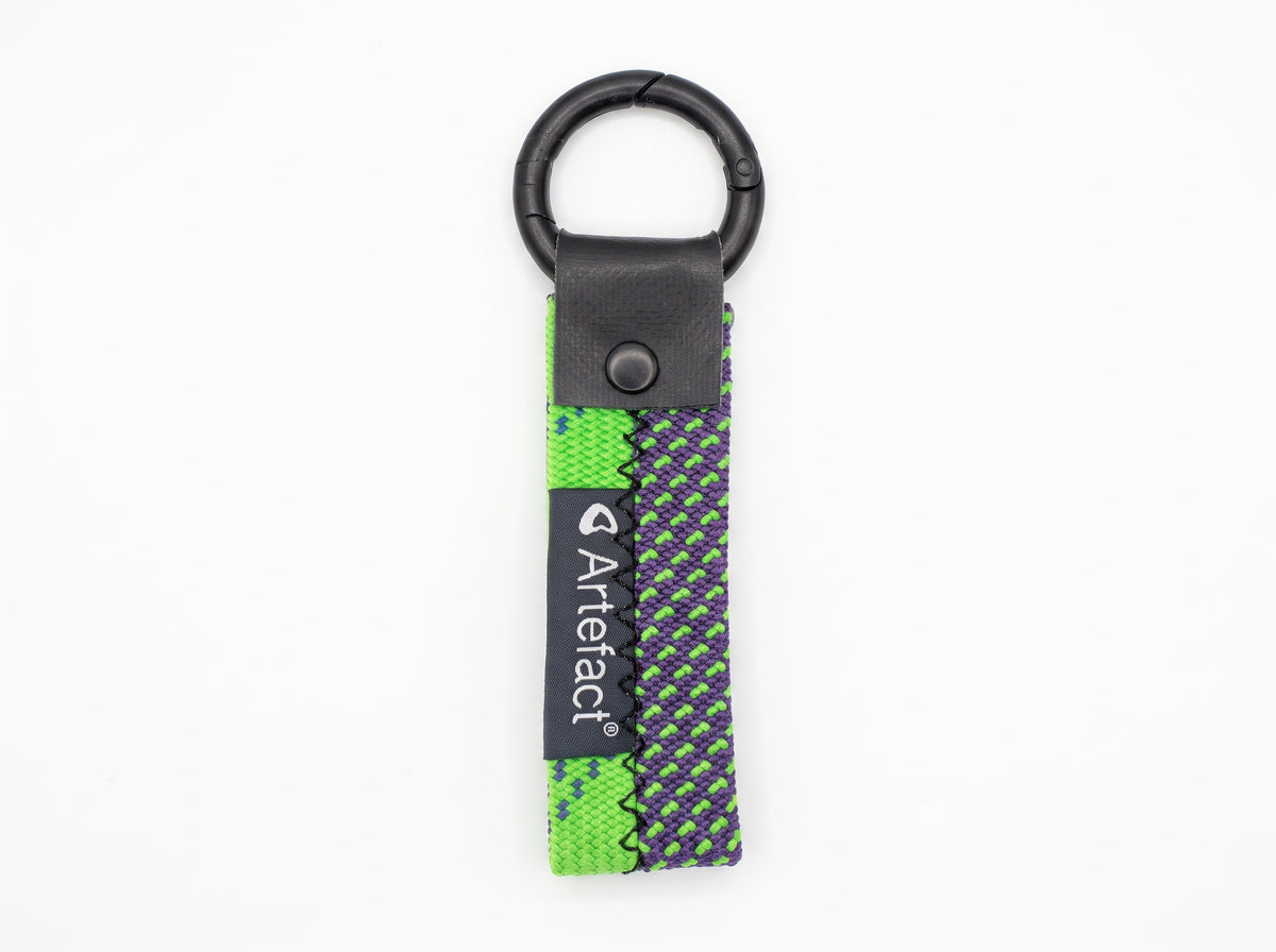 Upcycled climbing rope keyring, mostly green with purple